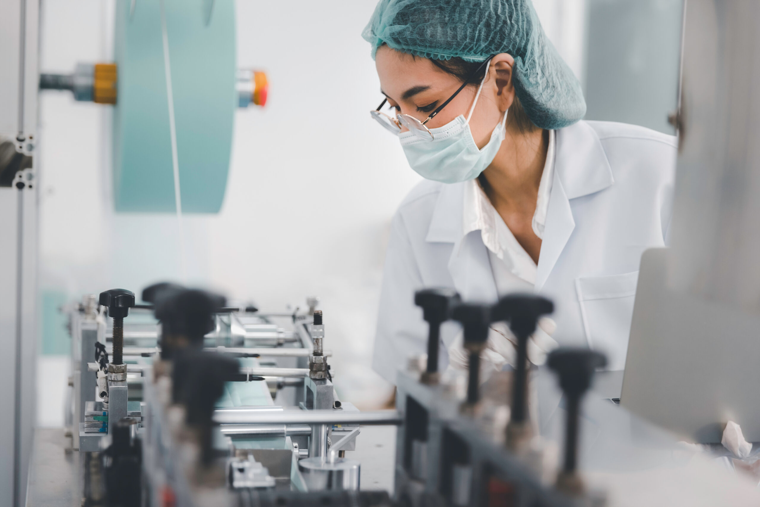 Thumbnail image of a woman in a pharmaceutical manufacturing facility.